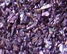 KMnO4 are dark purple needle shaped crystals - they are toxic and can stain your skin - handle with care!